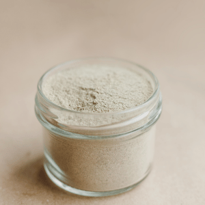 jar of powdered flea and tick preventative for pets