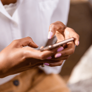 woman texting in Dallas, TX